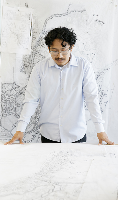 student looking at plans