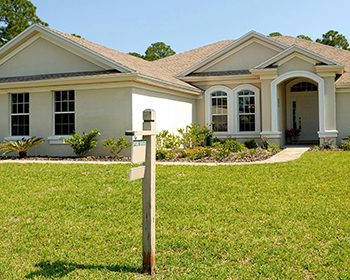 house with for sale sign