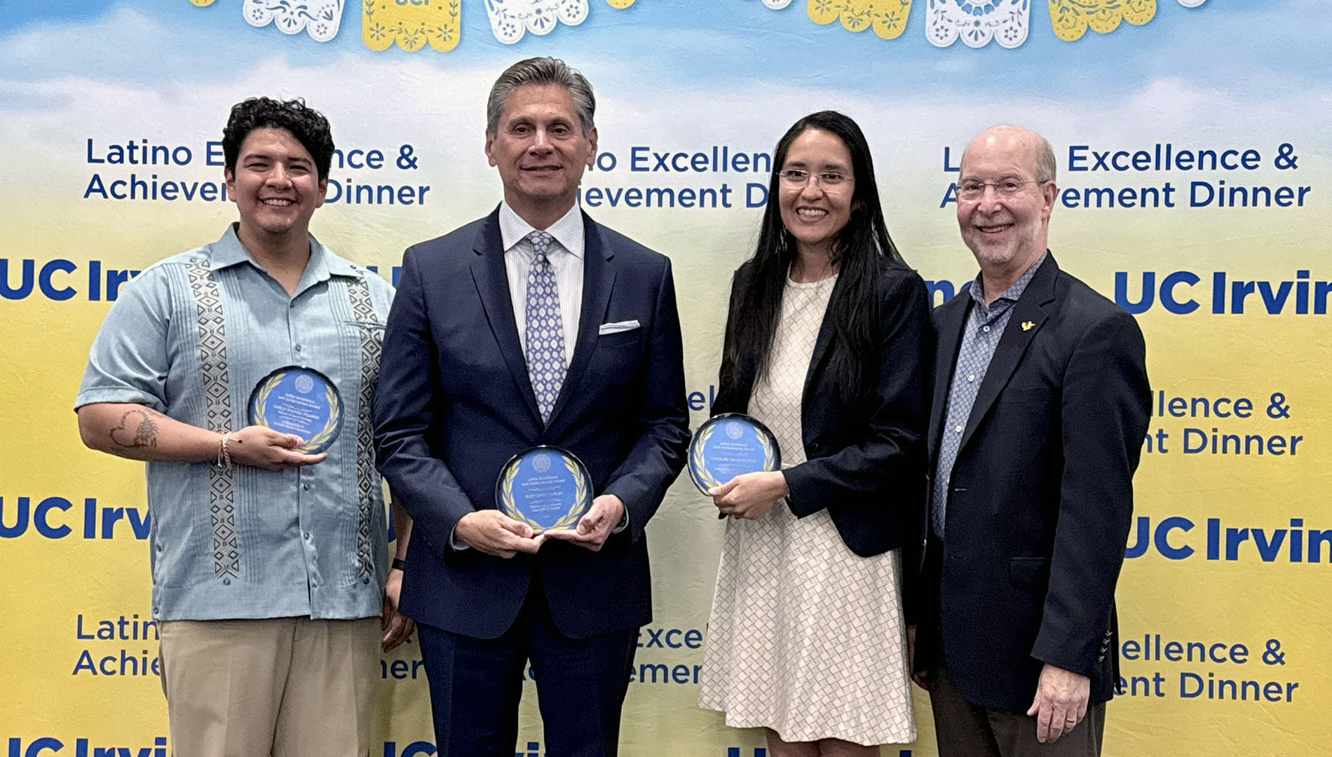 From left: Carlo Chunga Pizarro, Eloy Ortiz Oakley, Carolina Valdivia and Dean Jon Gould