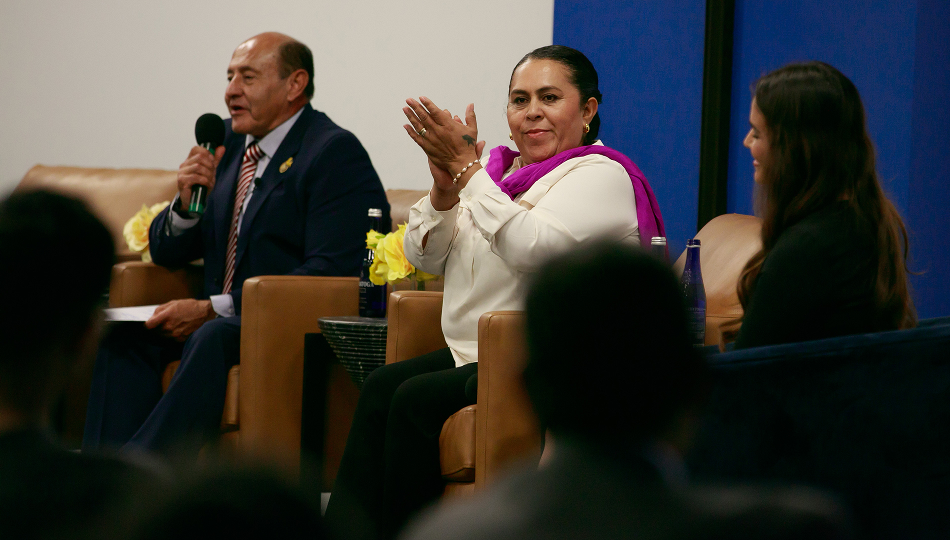 speakers on stage