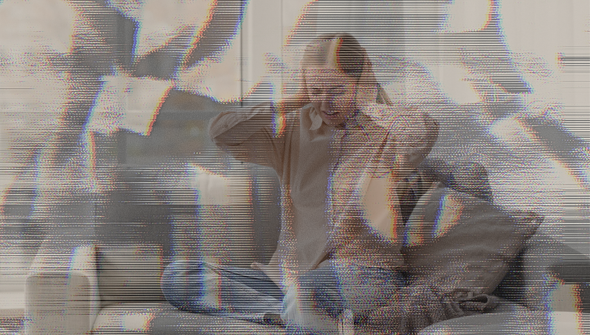 Distorted filter over woman holding her head and grimacing