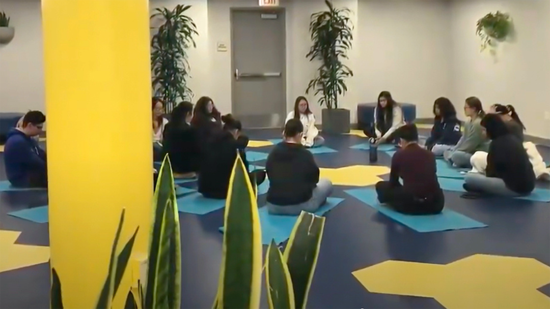 students meditating