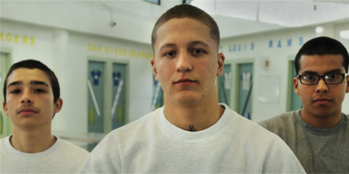 Three male youths are shown in promotional image for the documentary "They Call Us Monsters."