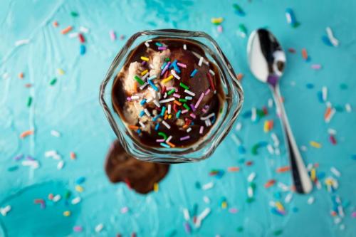 Overhead image of ice cream with LOTS of sprinkles by David Calavera on Unsplash