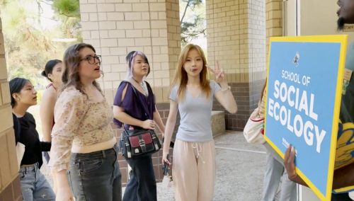 students walking into building