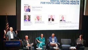 panelists on stage
