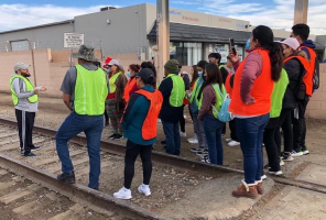 Comunidad Unida Aire Limpio (CUAL) committee is seen on a toxic tour through the industrial corridor in Southeast Santa Ana in December 2022. Picture courtesy of Sarahi Gutierrez